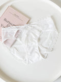 Lace-Trimmed Low-Waist Thong Panties with Thin Straps and Satin Mesh