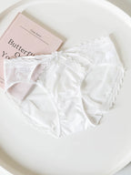 Lace-Trimmed Low-Waist Thong Panties with Thin Straps and Satin Mesh