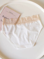 Seamless Ice Silk Low-Waist Briefs with Lace Trim and Cotton Crotch